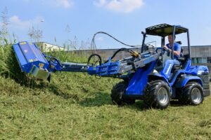 Mini loader 8 series with flail mower with side shift